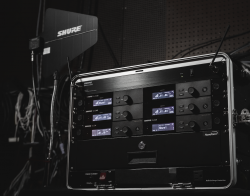 SLXD_Rack_Backstage_Environment_hero_Desat.png