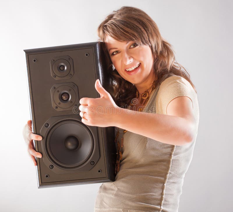 beautiful-woman-holding-big-wooden-speaker-young-closed-eyes-listening-music-37367289.jpg
